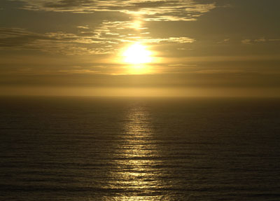 Sunset over the Pacific, seen from the Coral Beach Cantina patio